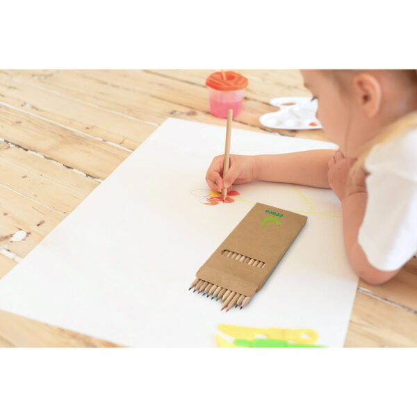 Little,Blonde,Girl,Painting,On,Big,White,Paper,While,Laying