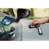 Close,Up,Hands,Woman,Pressing,Remote,Systems,Key,Near,Car